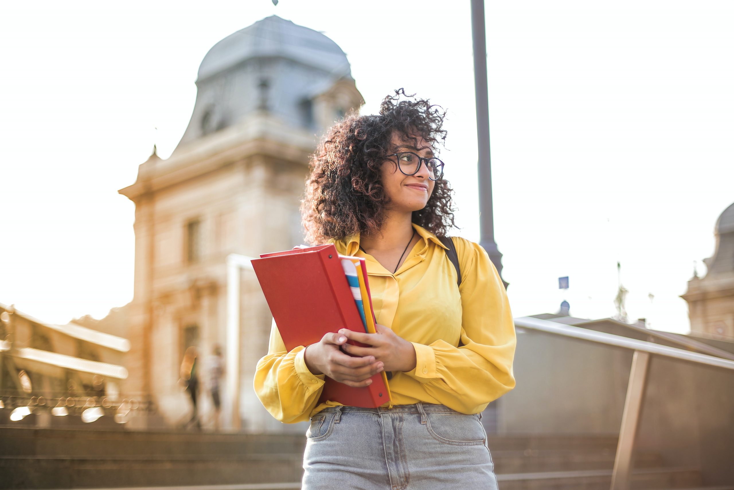 Girl holding books