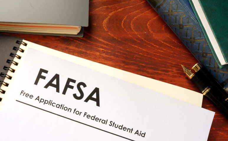 FAFSA booklet on table.