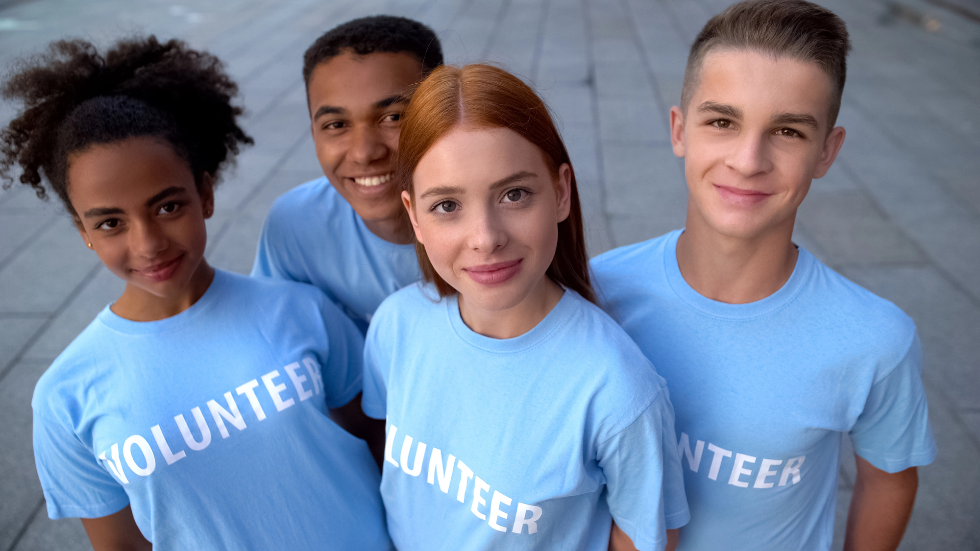 Teens wearing volunteer tshirts