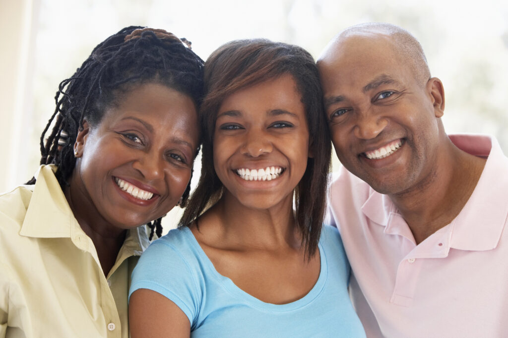teen girl with her parents