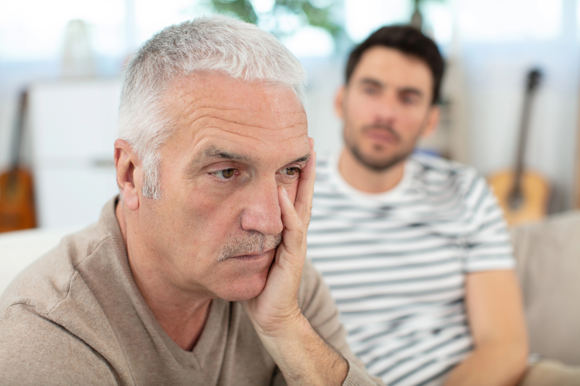 Father and son together. Father is frustrated.