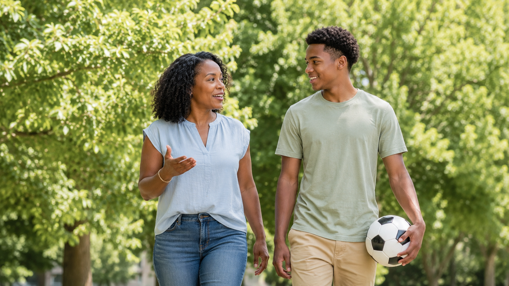 Mother and teenage son have a relaxed summer conversation outdoors about future plans and college readiness.